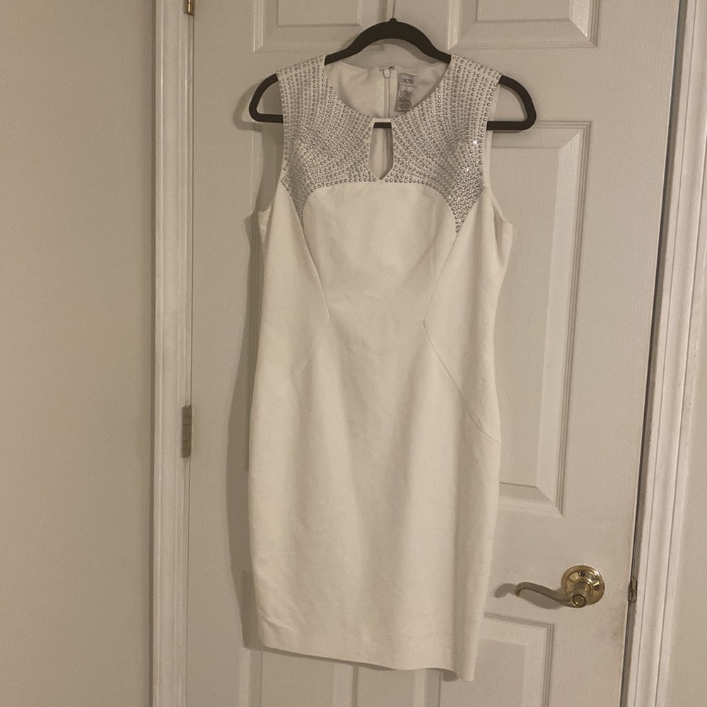 Cache White dress with silver studs size 10.